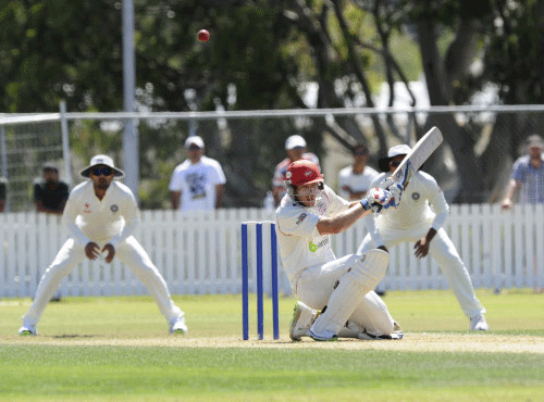 New Zealand XI’s George Walker ducks against  bouncer against India on  the first day of a pre test warm up cricket match at Cobham Oval in  Whangarei, New Zealand, Sunday, Feb. 2, 2014.AP photo