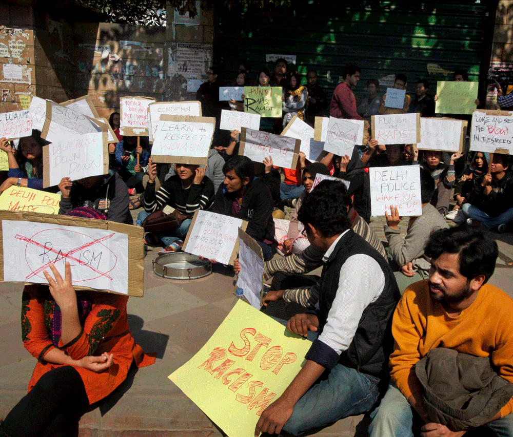 New Delhi: Students protest against Manipuri teenager rape outside  Patiala house court in New Delhi on Sunday. PTI Photo by Atul  Yadav.(PTI2_9_2014_000090B)