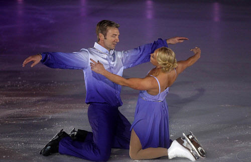 British ice skating pair Torvill and Dean, Jayne Torvill and Christopher Dean, perform during a show in Sarajevo February 13, 2014. Ice dancers Jayne Torvill and Christopher Dean made an emotional return on Thursday to the venue of their gold medal-w...