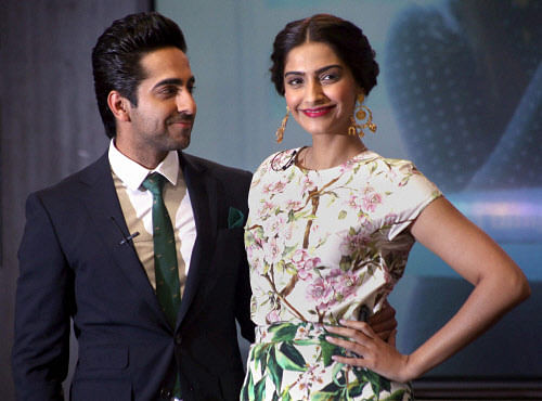 Bollywood actors Sonam Kapoor alongwith Ayushmann Khurrana during a promoitional event for their upcoming film 'Bewakoofiyaan' in Mumbai on Friday. PTI Photo 