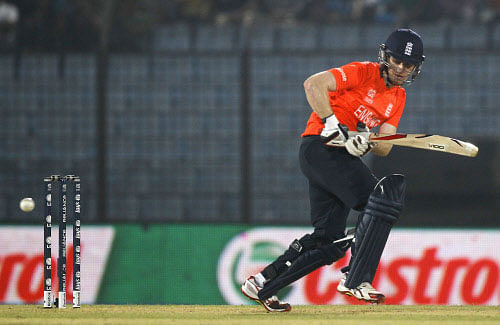 England's Eoin Morgan plays a shot during their ICC Twenty20 Cricket  World Cup match against South Africa in Chittagong, Bangladesh,  Saturday, March 29, 2014.AP photo