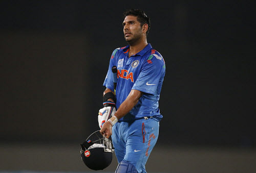 India's batsman Yuvraj Singh leaves the ground after losing his wicket during their ICC Twenty20 Cricket World Cup semi-final match against South Africa in Dhaka, Bangladesh, AP.