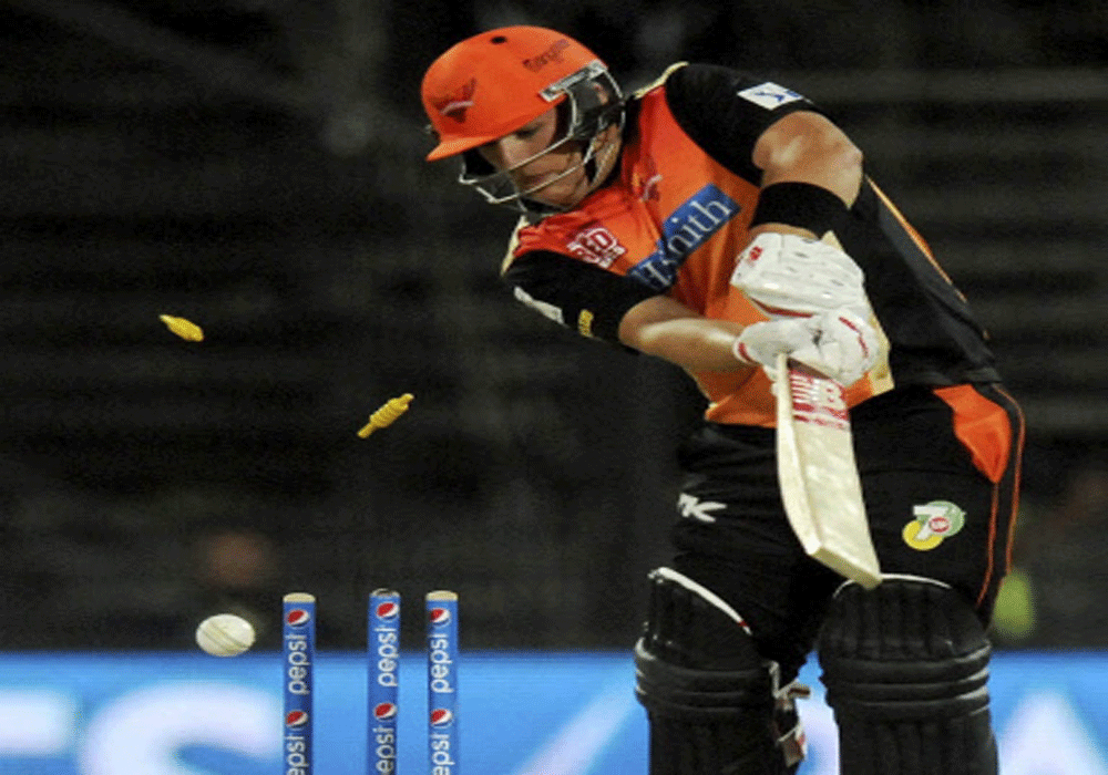 Aaron Finch of the Sunrisers Hyderabad gets bowled out by Lakshmipathy Balaji of the Kings X1 Punjab during an IPL 7 match in Sharjah on Tuesday. PTI Photo