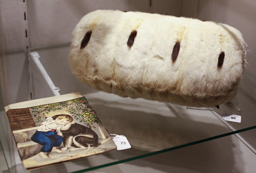 A muff and a handmade painting belonging to Austrian Hungarian Empress Elisabeth are on display in the Austrian auction house Dorotheum in Vienna April 28, 2014. Elisabeth was the wife of Emperor Franz Joseph I, a selection of whose personal items we...