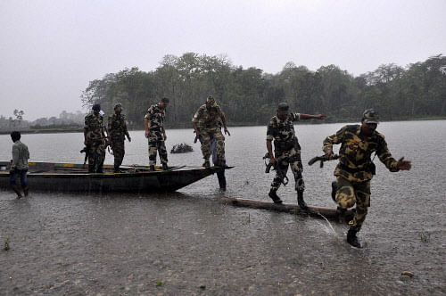 Khagrabari: Army personnel get down from a boat after search operation in the village Khagrabari where the tribal armed miscreants killed people from the Khagrabari village under Bodoland Territorial Area Districts (BTAD) under Baksa district on Satu...