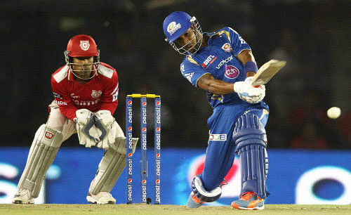 Lendl Simmons of the Mumbai Indians attempts to pull a delivery during  an IPL 7 against the Kings XI Punjab in Mohali on Wednesday.   PTI Photo