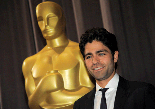 Actor Adrian Grenier, a presenter at the 41st Student Academy Awards, poses before the ceremony at the Directors Guild of America on Saturday, June 7, 2014 in Los Angeles. AP