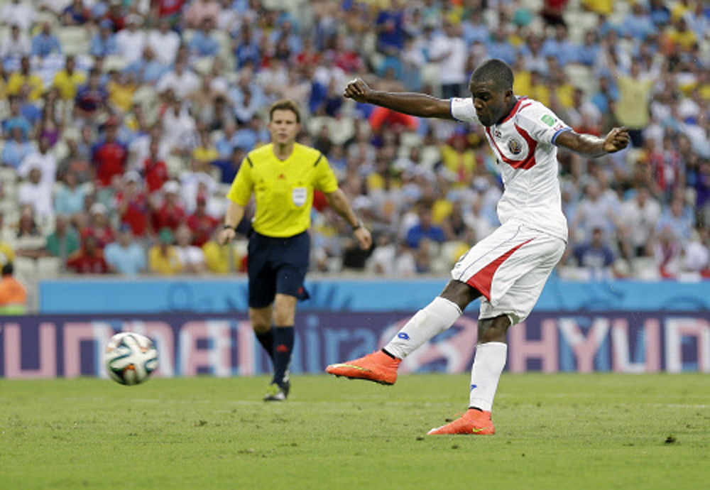 Costa Rica's Joel Campbell scores his side's first goal against Uruguay during the group D World Cup soccer match between Uruguay and Costa Rica at the Arena Castelao in Fortaleza, Brazil, Saturday, June 14, 2014. (AP Photo
