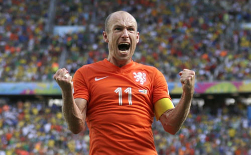 Netherlands' Arjen Robben celebrates after the World Cup round of 16 soccer match between the Netherlands and Mexico at the Arena Castelao in Fortaleza, Brazil, Sunday, June 29, 2014. AP Photo