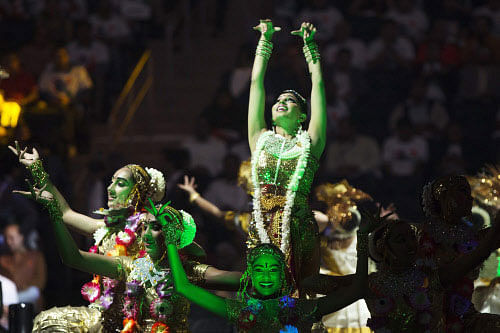 Dancers perform before India's Prime Minister Narendra Modi speaks at  Madison Square Garden in New York, during his visit to the United  States, September 28, 2014. REUTERS