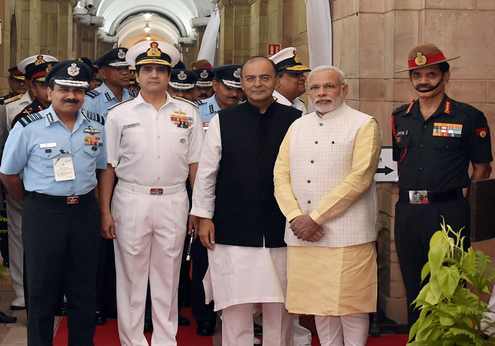 New Delhi: Prime Minister Narendra Modi poses for a photo with Defence Minister  Arun Jaitley, Air Chief Marshal Arup Raha, Navy Chief Admiral RK Dhowan  and Army Chief General Dalbir Singh Suhag during the Annual Combined  Commanders Conference of t...
