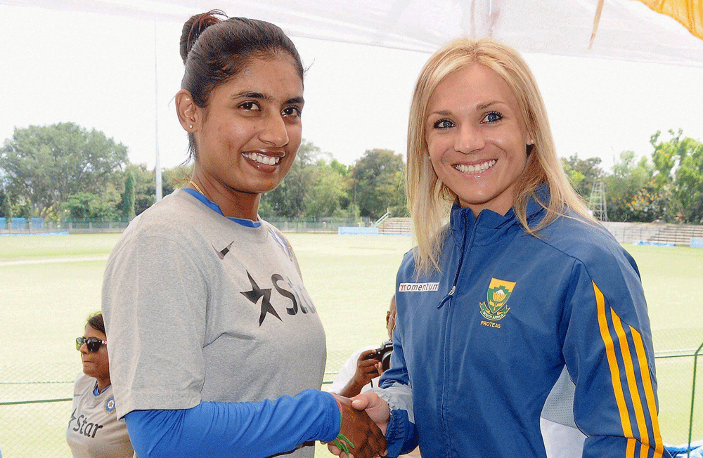 Mysore: Indian women's cricket captain Mithali Raj and her South African counterpart Mignon du Preez at a press conference in Mysore on Saturday ahead of the first test match. PTI Photo 
