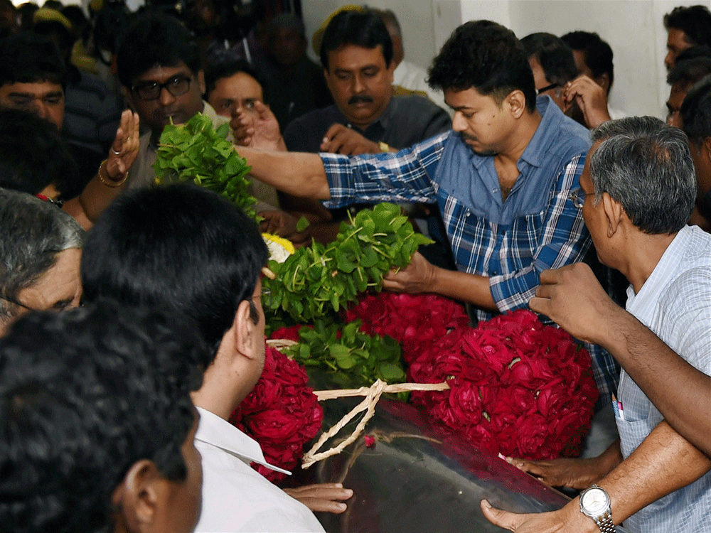 Actor Vijay pays his last respects at the funeral of Dadasaheb Phalke Award winner and veteran film director K Balachander, at his residence in Chennai on Wednesday. PTI Photo