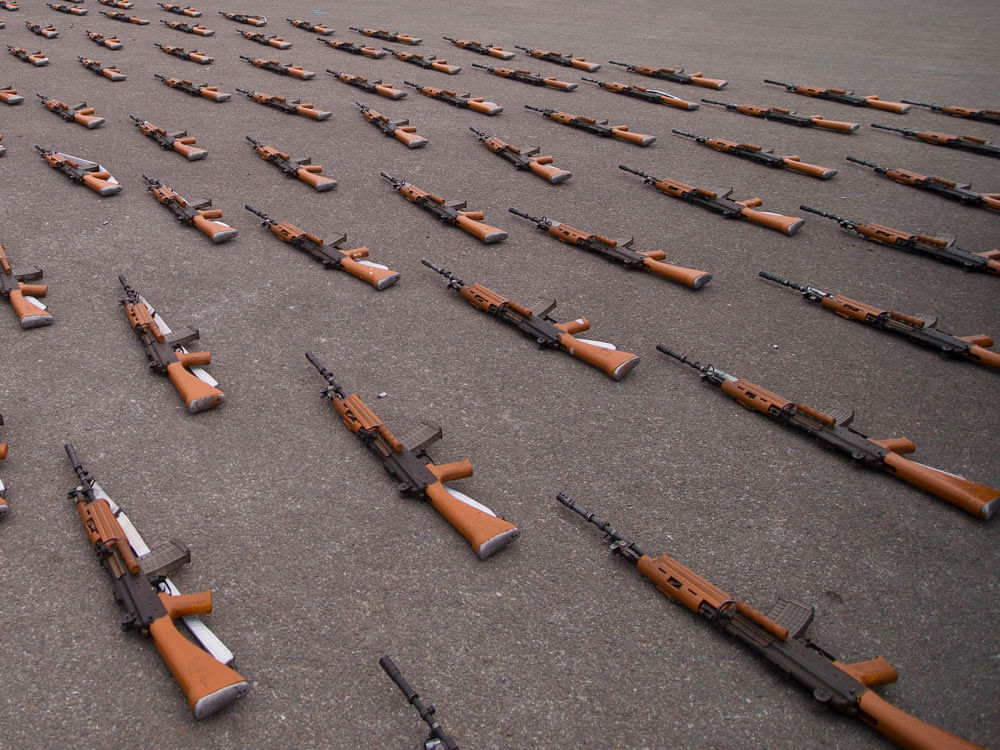 Indian soldiers get ready for a practice session ahead of Republic Day parade in New Delhi, India. AP Photo.