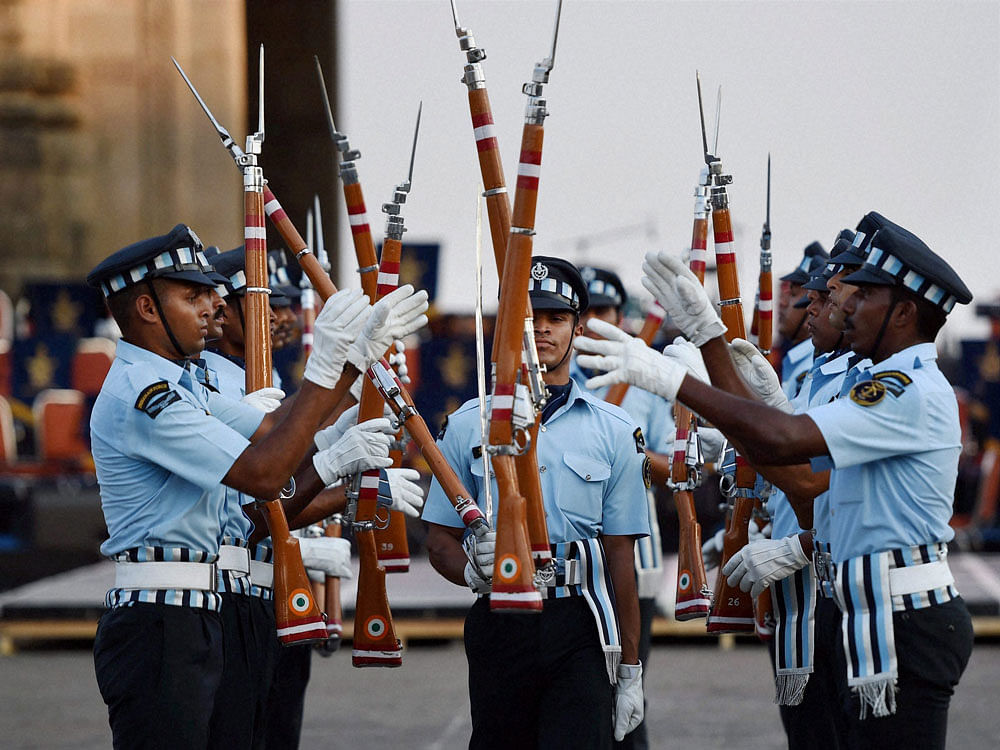 Indian Air Force officers perform during the rehearsal for the  celebration of 50th year of the 1965 campaign at the Gateway of India in  Mumbai on Tuesday.