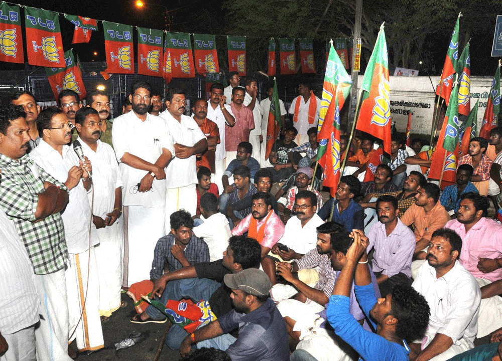 Kerala BJP workers during a protest out side of the Kerala assembly in Thiruvananthapuram on Thursday. PTI Photo