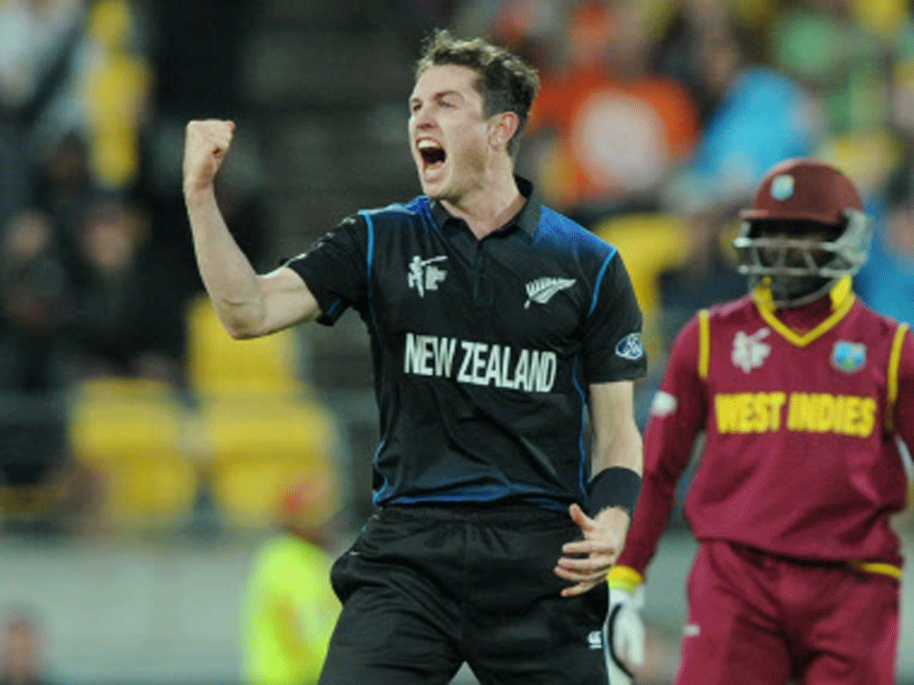 New Zealand’s Adam Milne celebrates after bowling out West Indies Chris Gayle during their Cricket World Cup quarterfinal match in Wellington, New Zealand, Saturday, March 21, 2015. AP Photo/