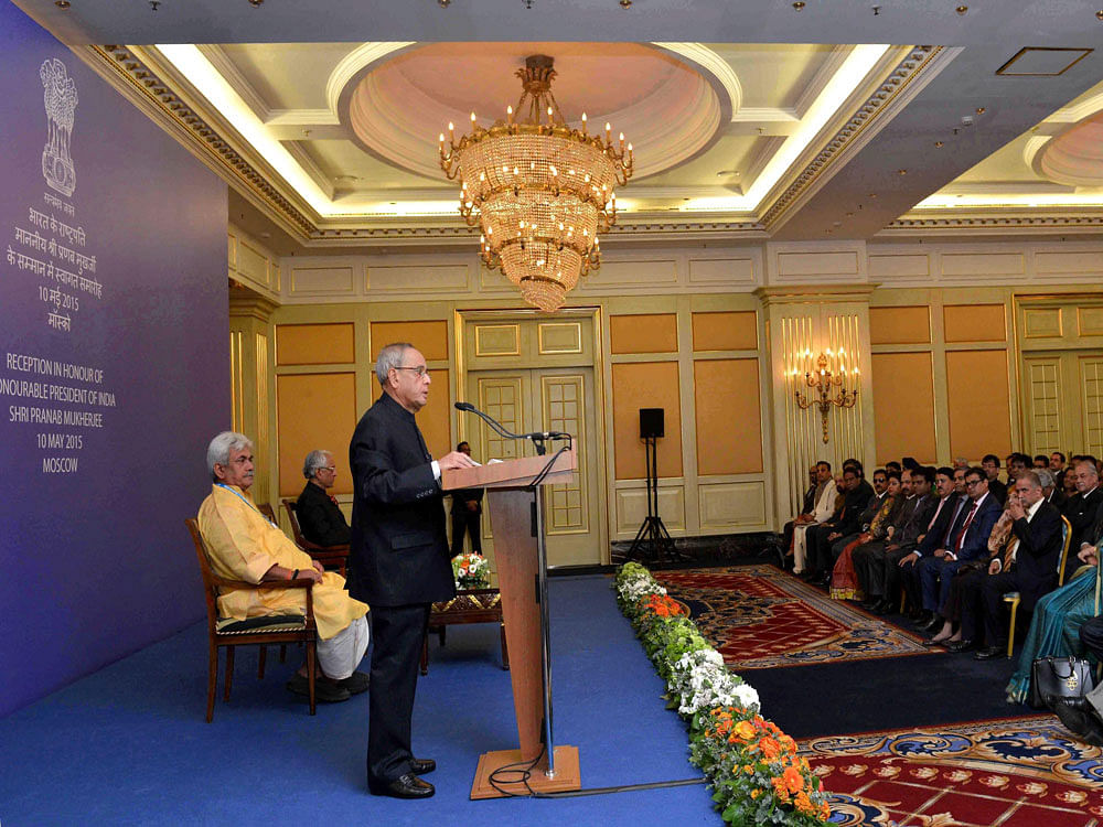  President Pranab Mukherjee addressing the Indian Community Reception in Moscow during his state visit to Russia on Sunday. PTI Photo.