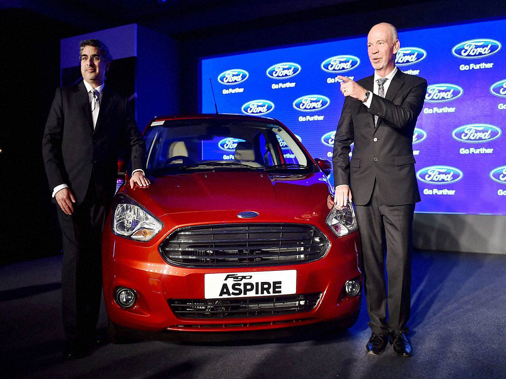 President and Managing Director, Ford India Nigel Harris(R) during a launch of 'Figo Aspire'in New Delhi on Wednesday. PTI Photo.