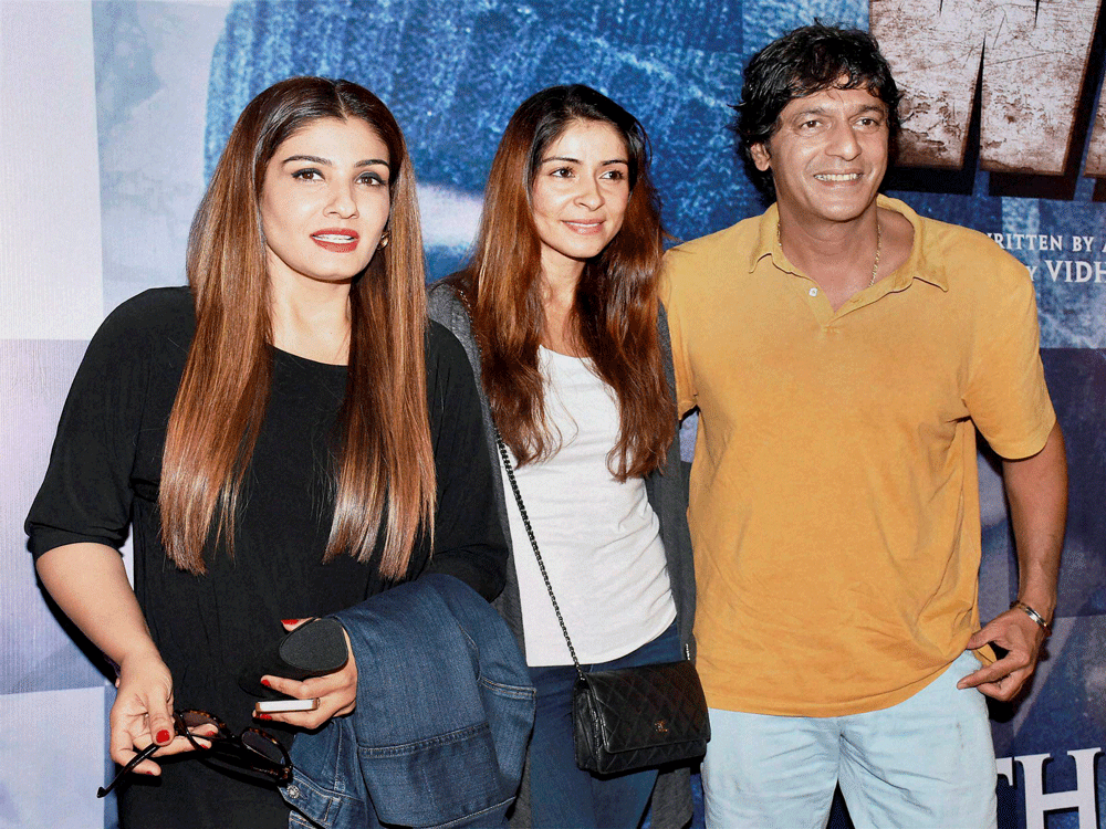  Bollywood actors Raveena Tandon and Chunky Pandey during the screening of upcoming film Wazir in Mumbai on Wednesday. PTI Photo.