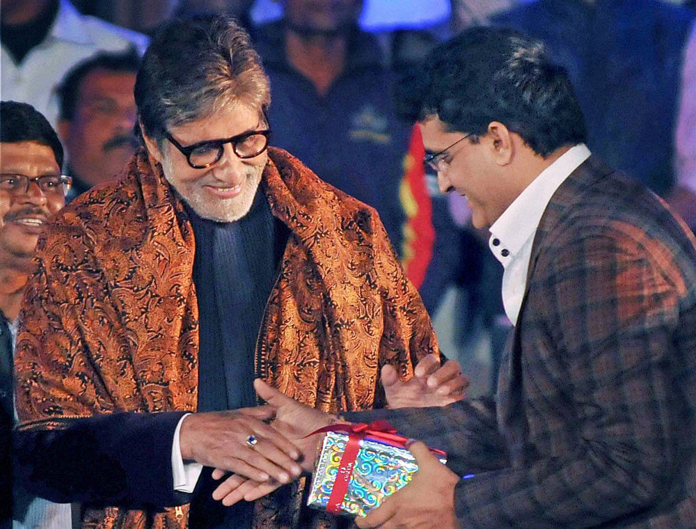 Bollywood megastar Amitabh Bachchan with former cricket captain Sourav Ganguly (R) during inauguration of a dance programme at historic Victoria Memorial in Kolkata on Tuesday evening. PTI Photo