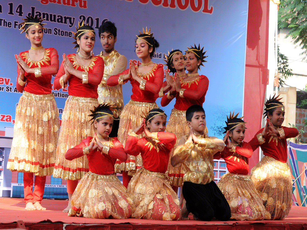 St Aloysius Gonzaga School perform welcome dance at a lay the foundation stone of St Aloysius Gonzaga School programme at Kindergarten Grounds in Mangaluru. DH Photo.