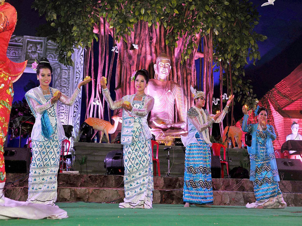  Artists from Myanmar perform during International Buddha Mahotsav in Bodhgaya on Monday. PTI Photo