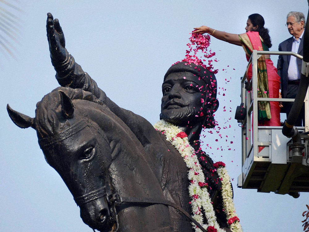 Mumbai Mayor Snehal Ambekar pays floral tributes to Chhatrapati Shivaji Maharaj on his birth anniversary at Shivaji Park in Mumbai on Friday. PTI Photo.