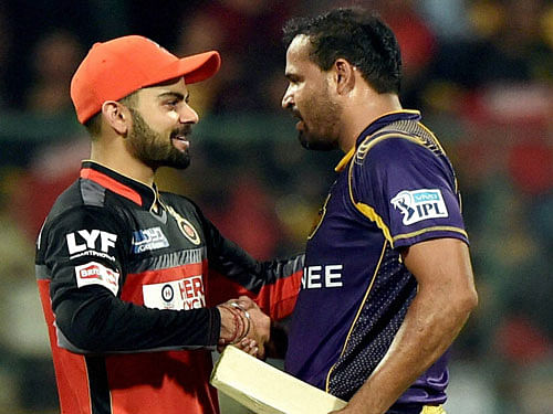 RCB Skipper congratulates KKR's Yusuf Pathan after KKR win during the IPL 2016 match against Royal Challengers Bangalore in Bengaluru on Monday. PTI Photo