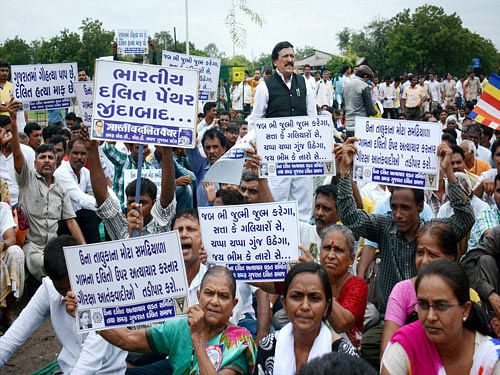  Dalit community people attend a Mahasammelan in Ahmedabad on Sunday in the wake of the recent Una incident. PTI Photo