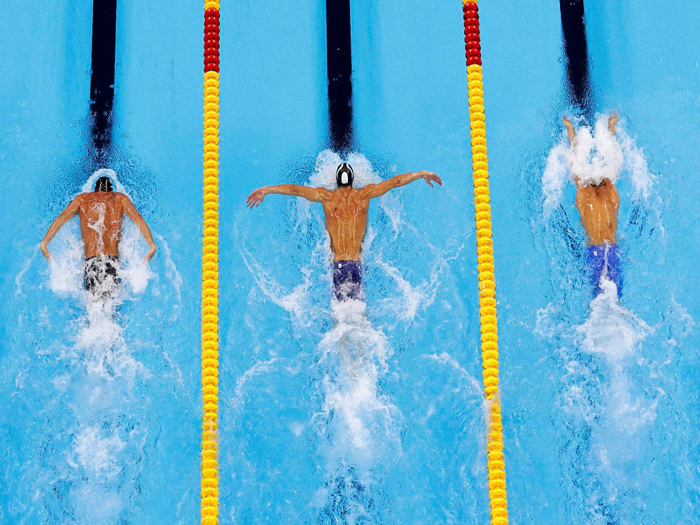  United States Michael Phelps, center is flanked by Ryan Lochte, right, and Brazil's Thiago Pereira in the 200m individual medley final during the swimming competitions at the 2016 Summer Olympics, Thursday. AP /PTI
