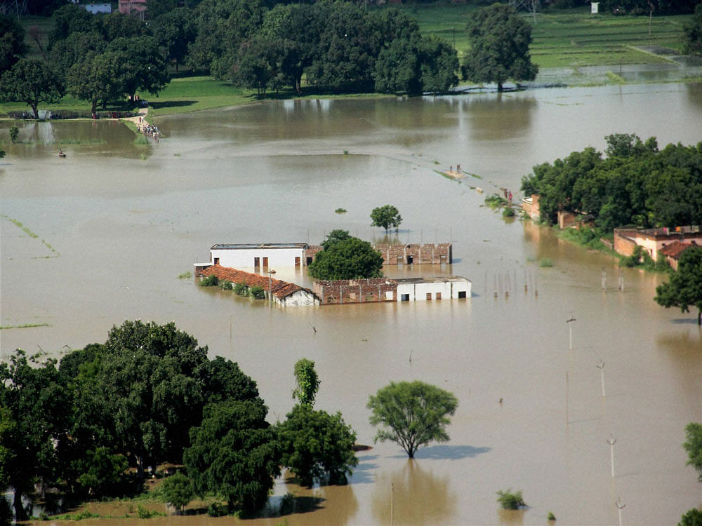   An aerial view of a flooded area in Allahabad on Thursday. PTI Photo