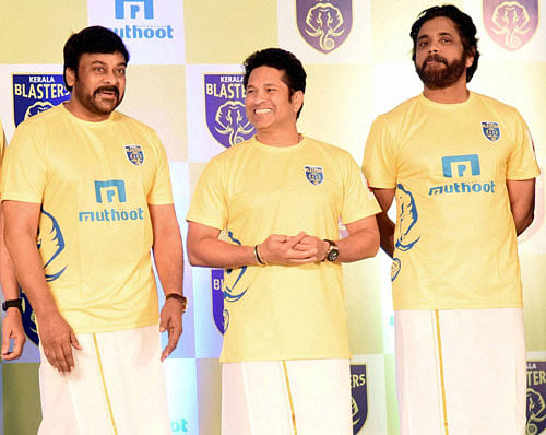 Cricket legend and Kerala Blasters owner Sachin Tendulkar with co- owners of the team Chiranjeevi, Nagarjuna at the unveiling of the Kerala Blasters jersey in Kochi on Wednesday. PTI Photo