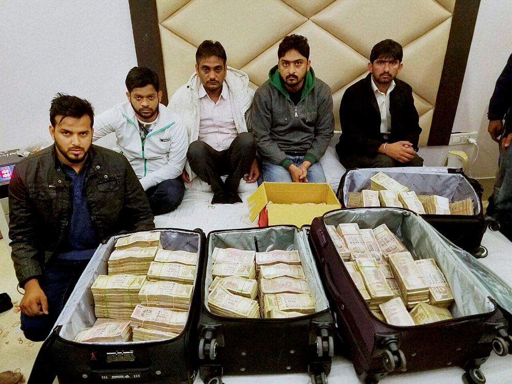 Police recovered Rs 3.25 crore in demonetised currency from five persons in a raid conducted at a Karol Bagh hotel on Tuesday night. PTI Photo