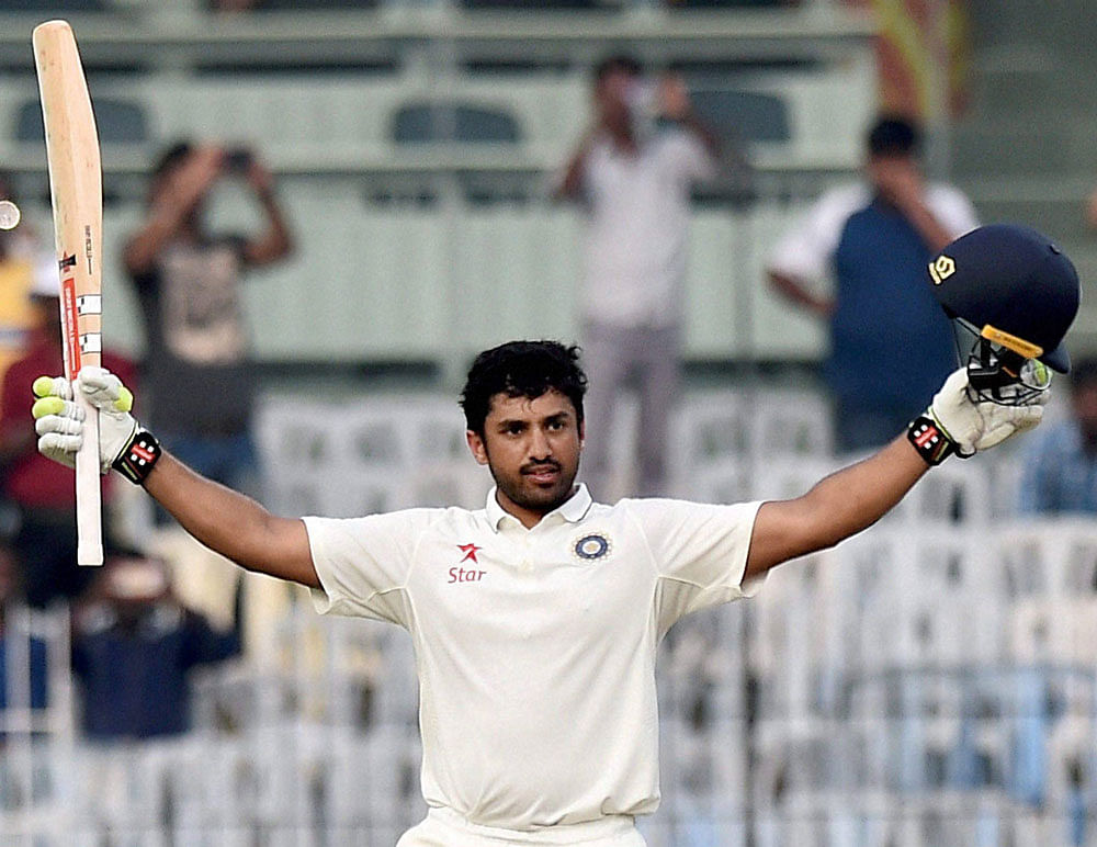 Indian batsman Karun Nair celebrates after scoring 300 runs during the fourth day of the fifth cricket test match against England at MAC Stadium, in Chennai on Monday. PTI Photo