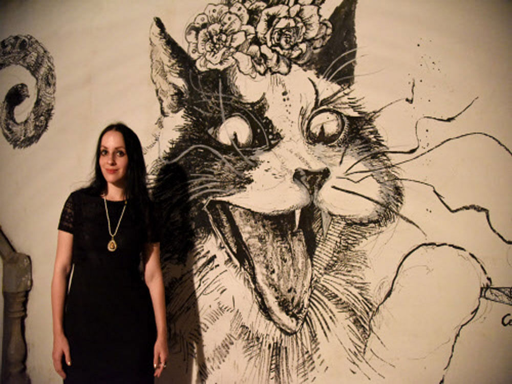 Molly Crabapple with her sketch in Bengaluru on Thursday. DH Photo