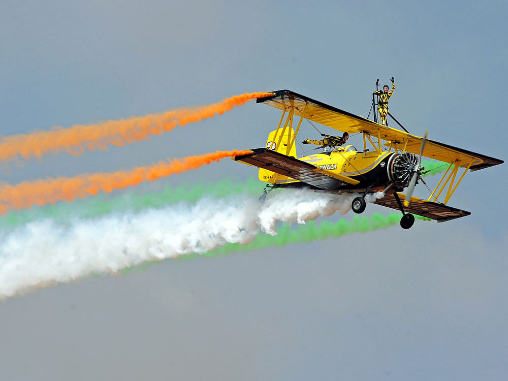Scandinaian Airshow team performs in the sky, at the 11th edition of Aero India 2017, at Yalahanka Air Force Station, on Tuesday. DH Photo/ Ranju P