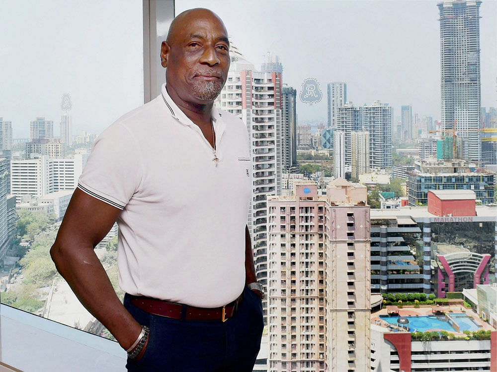  Sir Vivian Richards pose for media after one to one interaction session, in Mumbai on Wednesday. PTI Photo