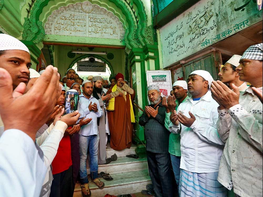 Muslims pray on the steps of a mosque during a demonstration against the U.S. decision to recognize Jerusalem as the capital of Israel, in Mumbai, India, December 15, 2017.