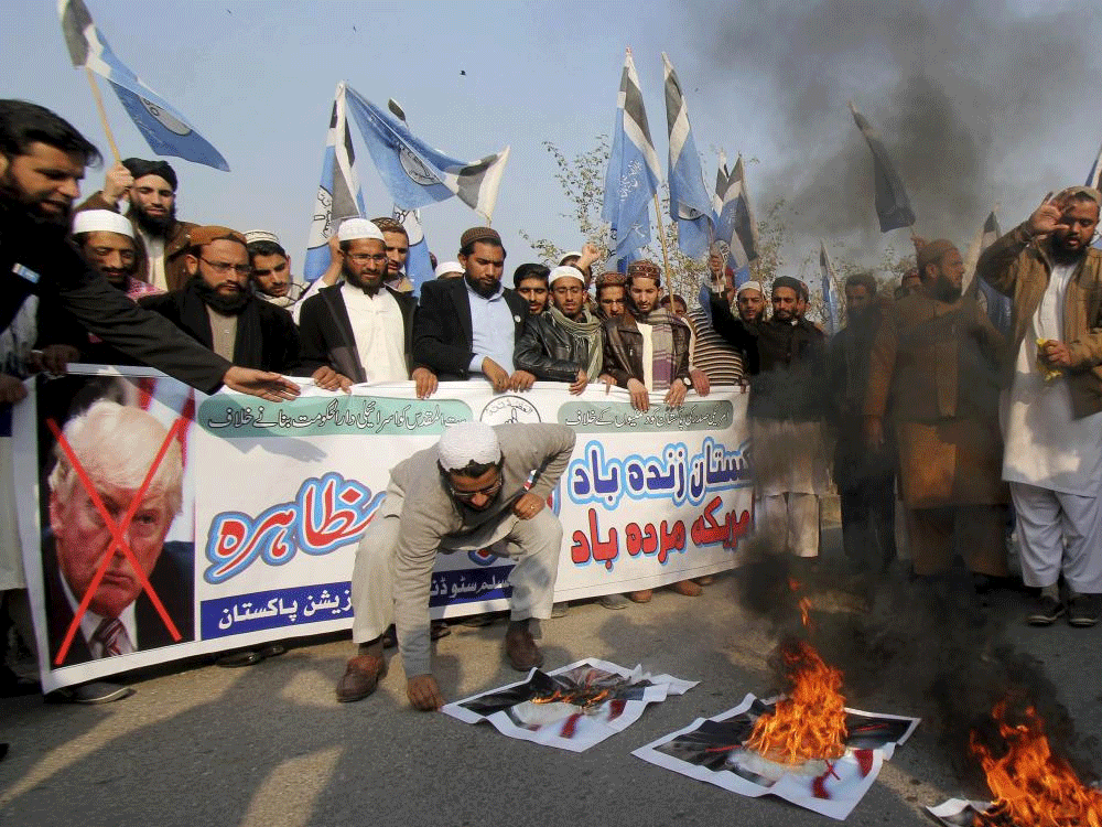  Pakistani students protest against U.S. President Donald Trump in Islamabad, Pakistan, holding a banner reads" long live Pakistan, down with America," Friday, Jan 5, 2018. A senior Pakistani senator has expressed disappointment at the U.S. decision...