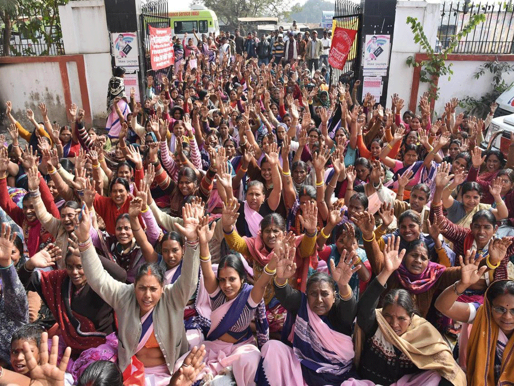 Bihar Medical and Public Health women employees raise slogans demanding equal pay for equal work in Patna on Monday. PTI Photo