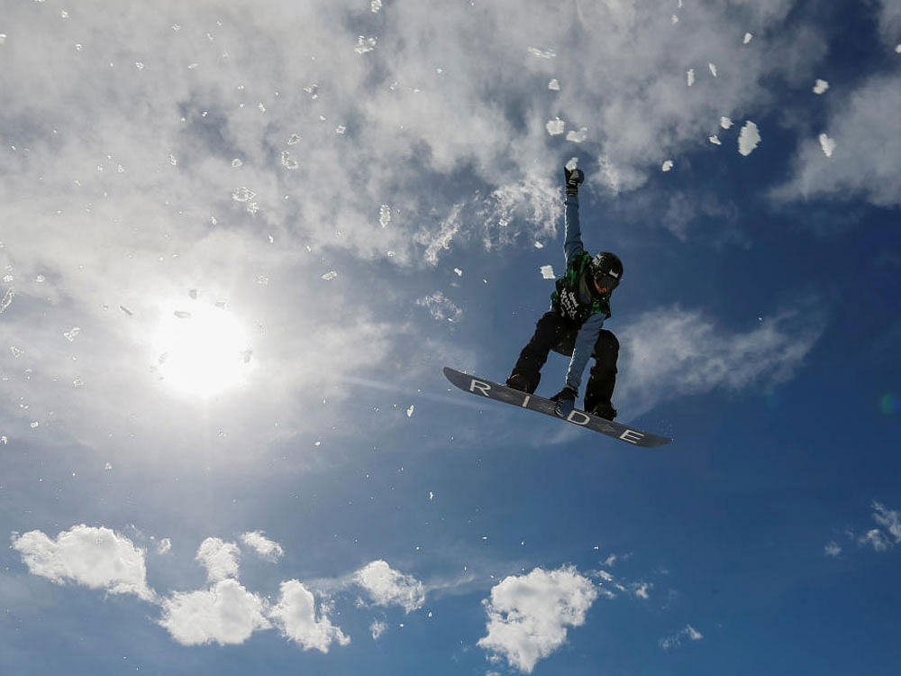 An athlete soars during Gorilla Winter Jungle snowboarding and freestyle skiing festival at Shymbulak ski resort outside Almaty, Kazakhstan March 10, 2018. 