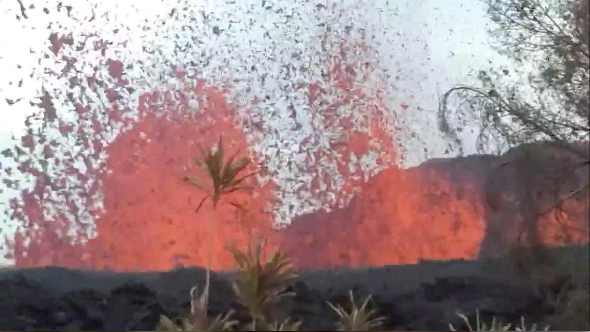Lava is seen from a fissure appearing behind a resident's backyard in Puna, Hawaii, U.S. Reuters photo