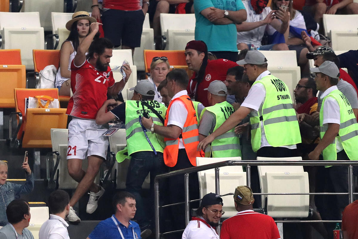 World Cup - Group G - Panama vs Tunisia - Mordovia Arena, Saransk, Russia - June 28, 2018 Staff apprehend a fan. Reuters