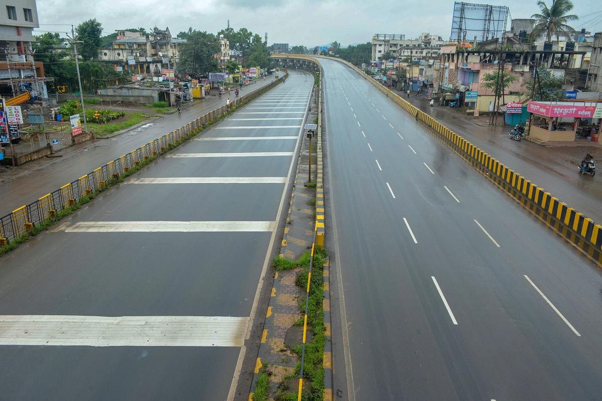 Pune-Bangalore National Highway wears a deserted look during a statewide bandh, called by Maratha Kranti Morcha for reservations in jobs and education, in Karad, Maharashtra. (PTI Photo)