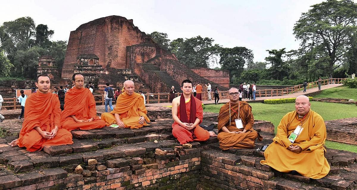 Foreign delegates who have arrived to take part in the International Buddhist Conclave- 2018, visits the ruins of the ancient Nalanda University, in Nalanda, Bihar on Saturday, August 25, 2018. PIB