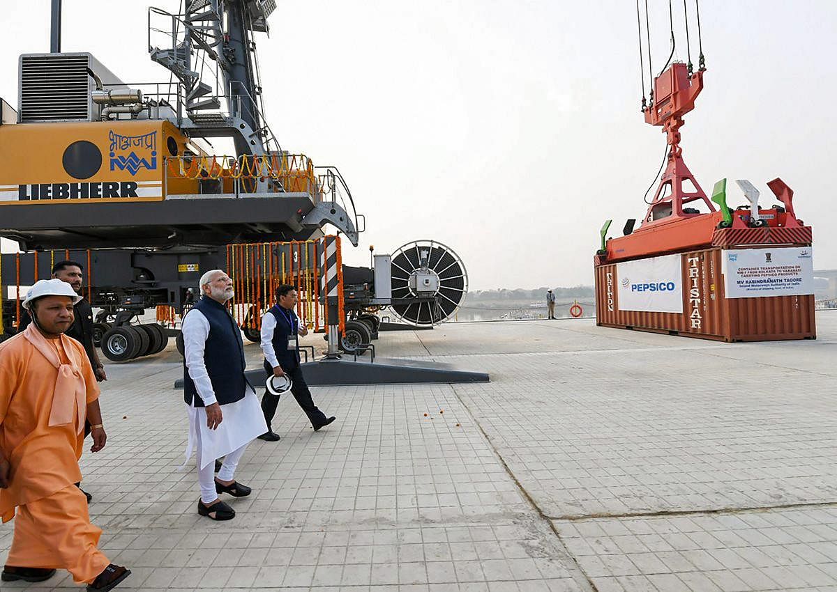 Prime Minister Narendra Modi looks on at India's first multi-modal terminal on the Ganga river during its inaugural function, in Varanasi, Monday, Nov 12, 2018. (PIB Photo via PTI) 