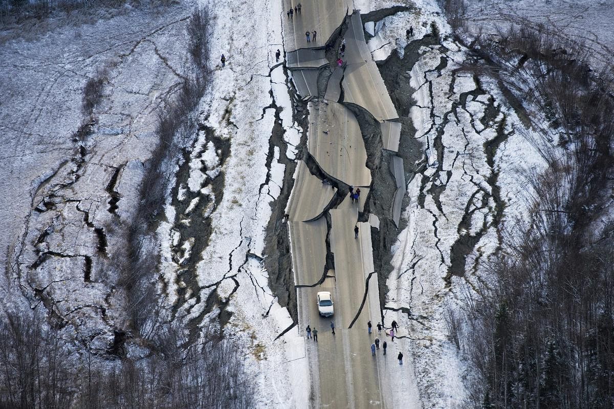 An aerial photo shows damage on Vine Road, south of Wasilla, Alaska, after back-to-back earthquakes measuring 7.0 and 5.7 shattered highways and rocked buildings in Anchorage and surrounding areas. (AP/PTI  Photo)