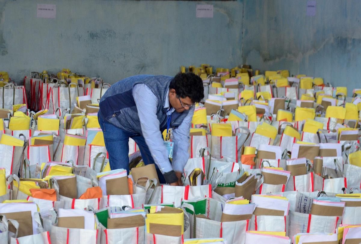  An election official prepares the electoral material for the first phase of Assam Panchayat elections at Amingaon in Kamrup (Rural) district. (PTI Photo) 