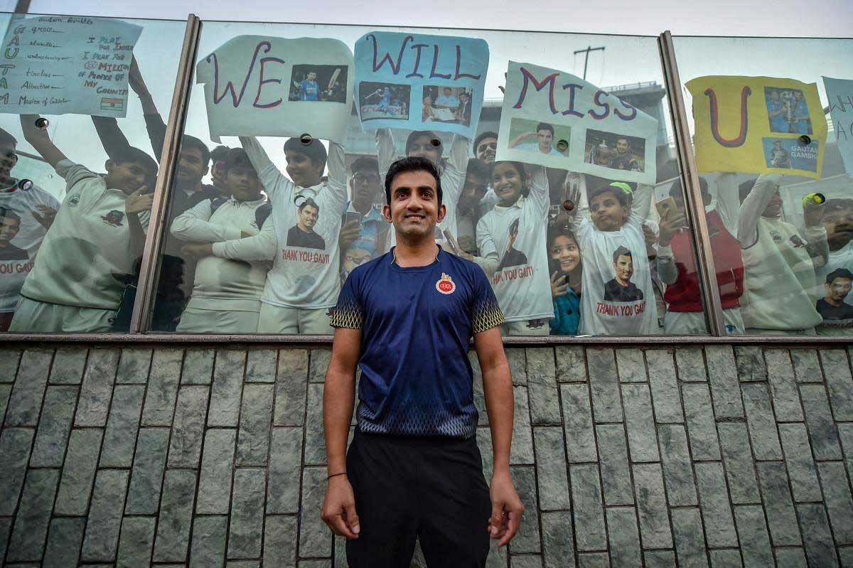 Cricketer Gautam Gambhir poses for photos with his fans on the last day of Ranji Trophy group league match between Delhi and Andhra at Feroz Shah Kotla Ground, in New Delhi, Sunday, Dec. 9, 2018. Gambhir announced retirement from all forms of cricket on Tuesday. (PTI Photo/Arun Sharma)